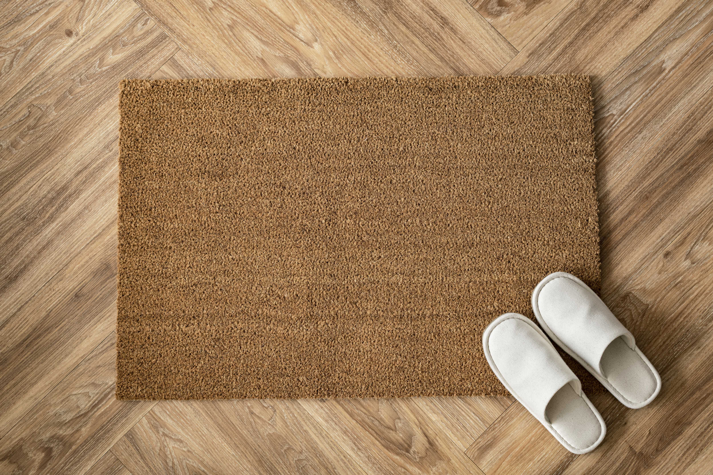 white-slippers-doormat.jpg